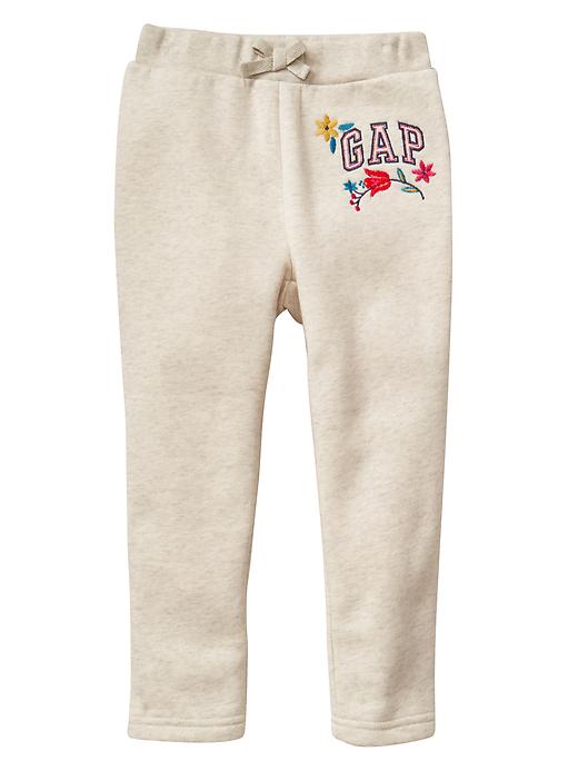 View large product image 1 of 1. Floral logo fleece pants