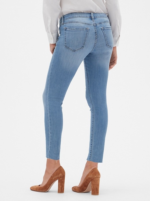 Mid Rise Legging Skimmer Jeans with RawHem Gap Factory