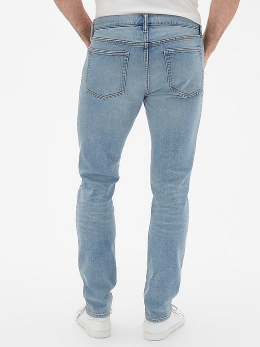 Image number 2 showing, Skinny Fit Jeans in Distressed with GapFlex