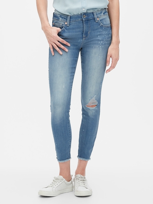 Image number 1 showing, Mid Rise Distressed Legging Skimmer Jeans