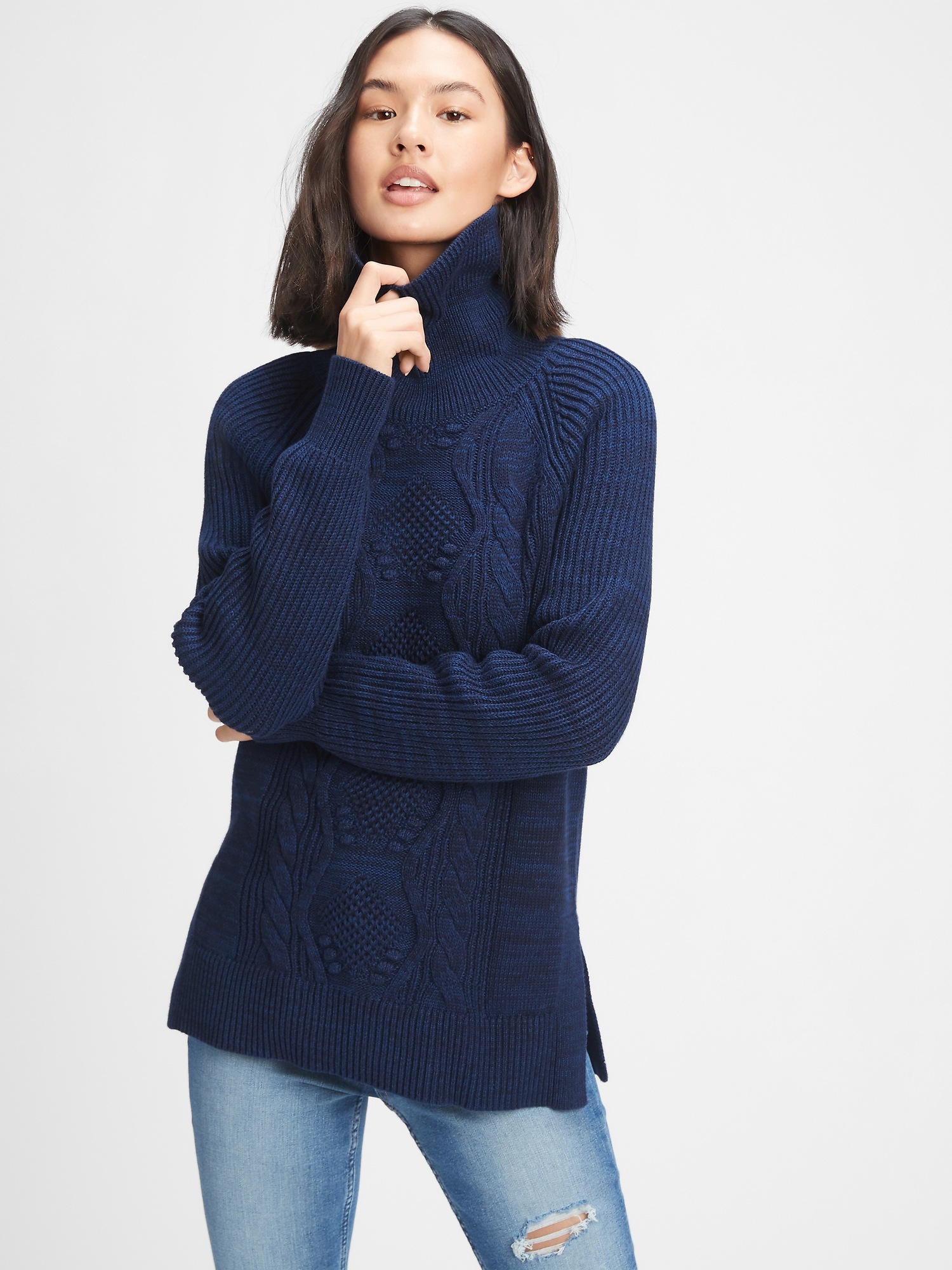 navy blue cable knit turtleneck sweater