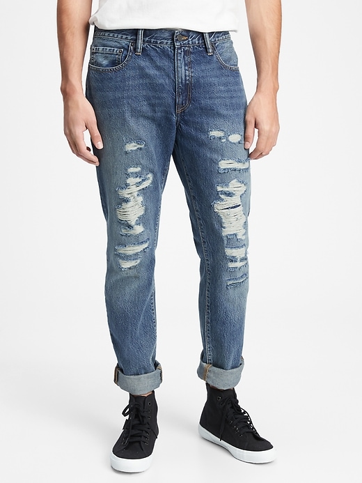 View large product image 1 of 3. Mid Rise Distressed Slim Jeans