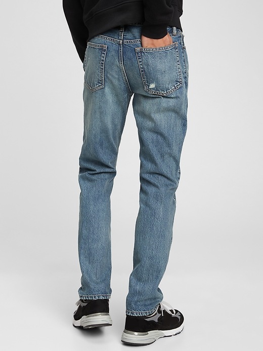 Image number 2 showing, Mid Rise Destructed Slim Jeans with Washwell&#153