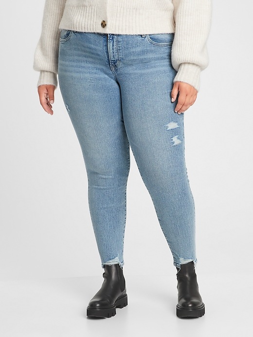 Image number 1 showing, Mid Rise Distressed Jeggings with Washwell