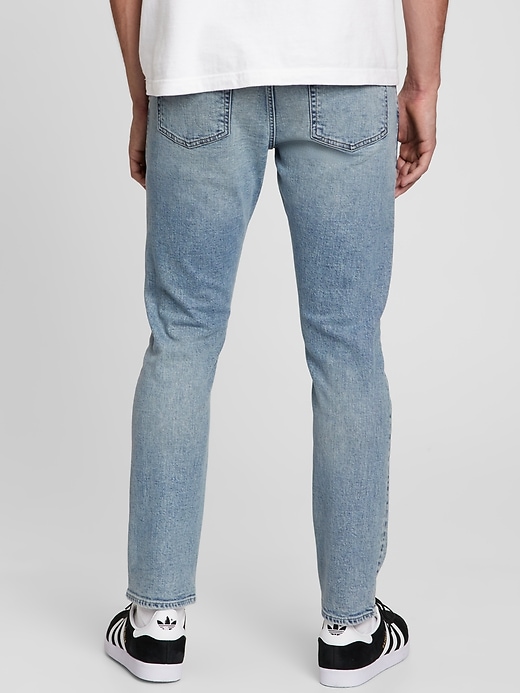 Distressed Straight Taper GapFlex Jeans with Washwell