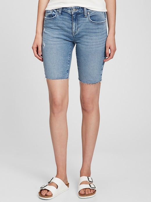 Image number 5 showing, 9" Mid Rise Distressed Denim Bermuda Shorts with Washwell