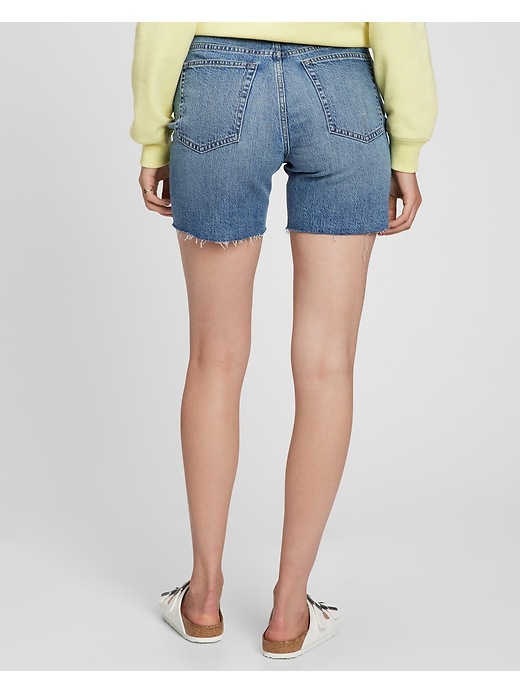 Image number 6 showing, 6" High Rise Destructed Cheeky Midi Denim Shorts with Washwell