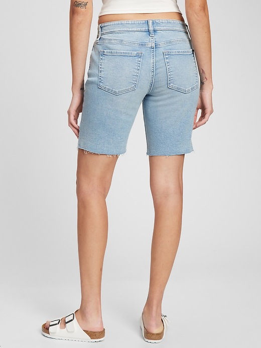 Image number 6 showing, 9" Mid Rise Distressed Denim Bermuda Shorts with Washwell
