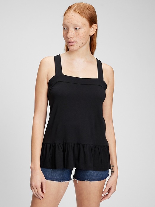 View large product image 1 of 1. Sleeveless Peplum Top