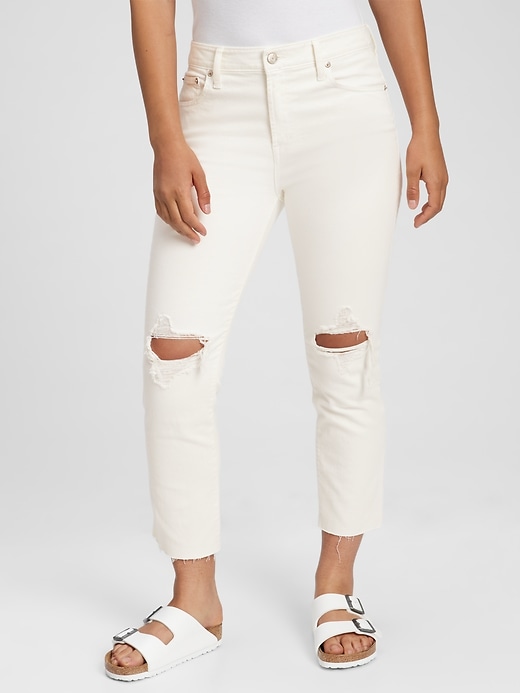 Image number 1 showing, Mid Rise Destructed Universal Slim Boyfriend Jeans