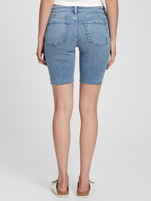 Image number 2 showing, 9" Mid Rise Distressed Denim Bermuda Shorts with Washwell