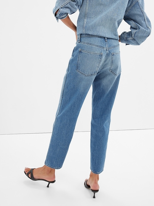 Image number 2 showing, High Rise Distressed Mom Jeans with Washwell