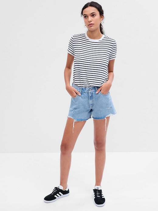 Image number 1 showing, 4" Mid Rise Destructed Stride Shorts with Washwell