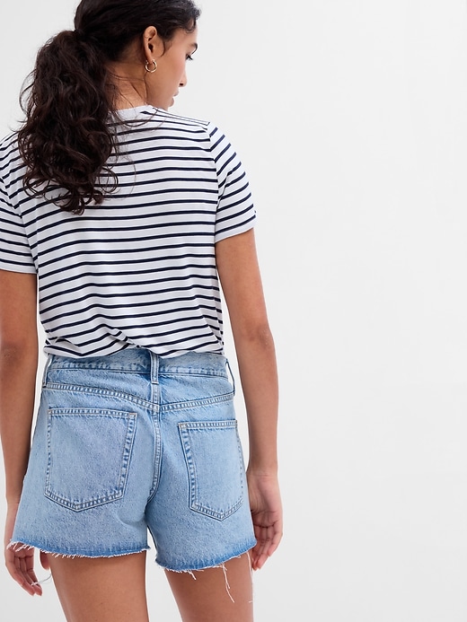 Image number 2 showing, 4" Mid Rise Destructed Stride Shorts with Washwell
