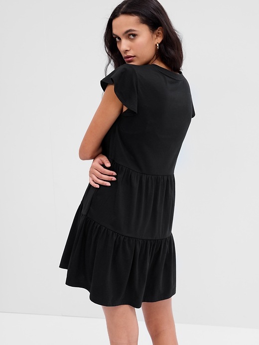 View large product image 2 of 3. Tiered V-Neck Flutter Sleeve Dress