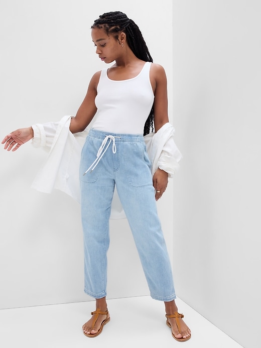 1 of 8 showing, with the color light wash of product Mid Rise Easy Jeans