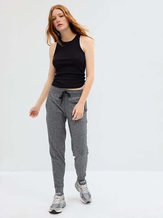 Image number 1 showing, GapFit Brushed Tech Jersey Joggers