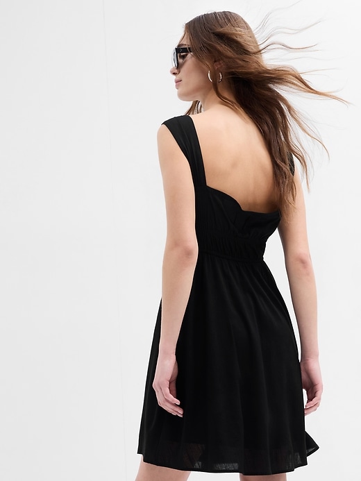 Image number 3 showing, Tie-Neck Smocked Mini Dress