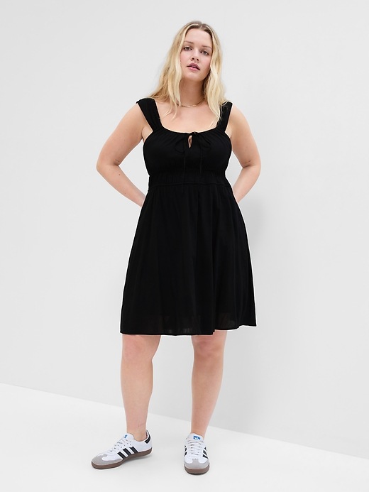 Image number 4 showing, Tie-Neck Smocked Mini Dress