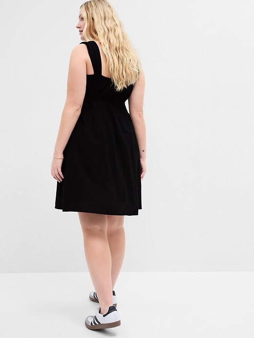 Image number 5 showing, Tie-Neck Smocked Mini Dress