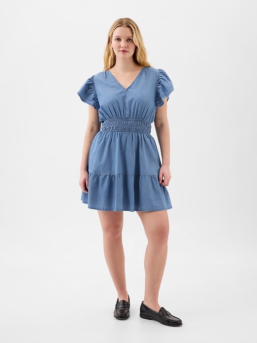 Denim Smocked Flutter Sleeve Mini Dress | Gap Factory
