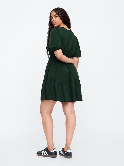 Image number 5 showing, Smocked Puff Sleeve Mini Dress