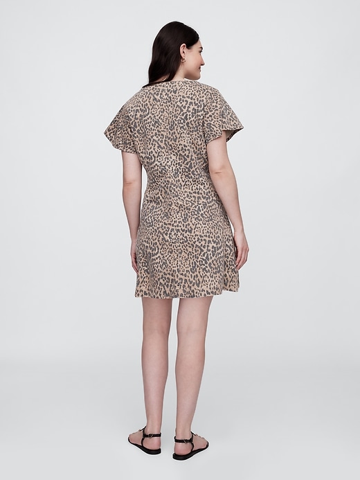 Image number 5 showing, Denim Flutter Sleeve Button-Front Mini Dress