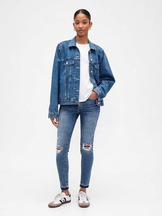 Image number 1 showing, Mid Rise Destructed Universal Skinny Jeans