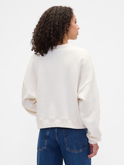 Image number 2 showing, Oversized Holiday Graphic Sweatshirt