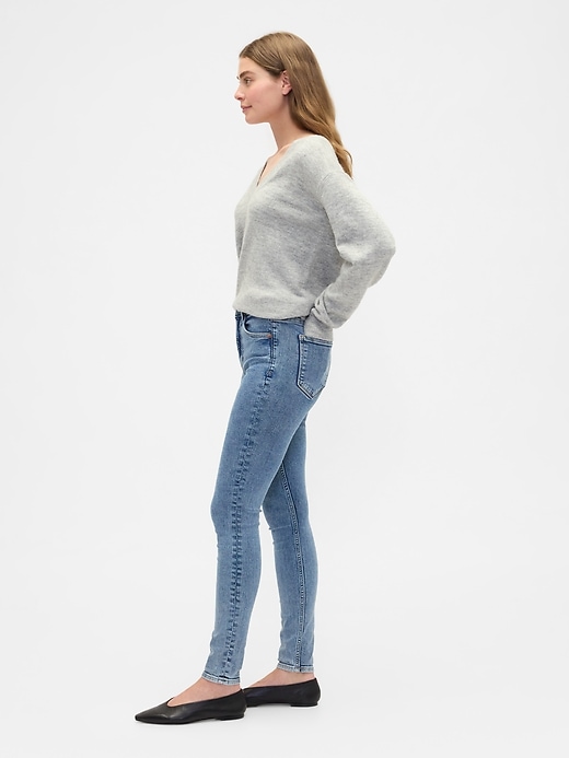 Image number 3 showing, High Rise Universal Skinny Jeans