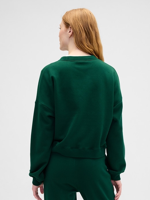 Image number 2 showing, Oversized Holiday Graphic Sweatshirt