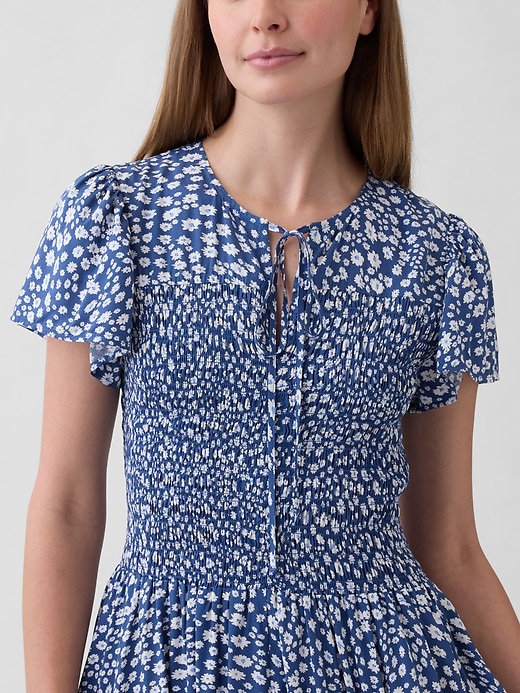 Image number 3 showing, Smocked Flutter Sleeve Midi Dress