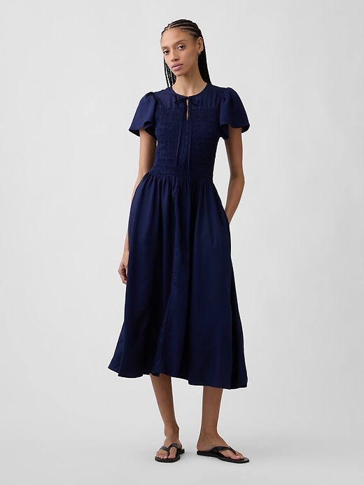 Image number 1 showing, Smocked Flutter Sleeve Midi Dress
