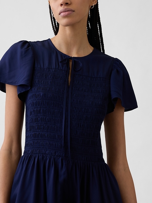 Image number 3 showing, Smocked Flutter Sleeve Midi Dress