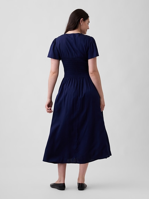 Image number 5 showing, Smocked Flutter Sleeve Midi Dress